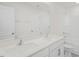 Modern bathroom with double sinks, quartz countertop, and tiled shower/tub at 113 Paper Birch Way, Fuquay Varina, NC 27526