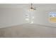 Spacious bedroom with natural light and neutral carpet at 113 Paper Birch Way, Fuquay Varina, NC 27526