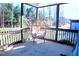 View of screened-in porch featuring comfortable wicker egg chairs at 1136 Knotty Oaks Dr, Apex, NC 27523