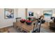 Dining room features a table with seating for six and open view of the living room at 120 Paper Birch Way, Fuquay Varina, NC 27526