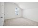 Bright bedroom with carpet, a window, and neutral paint at 121 Willow Cameron Way, Angier, NC 27501