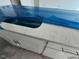 New countertop with a stainless steel sink insert and protective plastic covering at 121 Willow Cameron Way, Angier, NC 27501