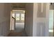 Hallway view of a home under construction, showing drywall and an unfinished floor at 121 Willow Cameron Way, Angier, NC 27501