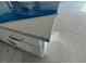 Close-up of an unfinished kitchen island with stylish hardware and light countertops at 121 Willow Cameron Way, Angier, NC 27501