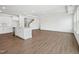 Open-concept living area with hardwood floors, bright white paint, and tons of natural light at 121 Willow Cameron Way, Angier, NC 27501