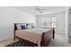 Cozy bedroom featuring a queen bed, ceiling fan, and lots of natural light at 1218 Twelve Oaks Ln, Apex, NC 27502