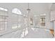 Bright sunroom with lots of natural light and beautiful views through large windows at 1218 Twelve Oaks Ln, Apex, NC 27502