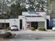 Exterior view of Bank of America branch, showing convenient ATM access and modern building design at 139 Kingsbury Dr, Chapel Hill, NC 27514