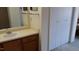 Bathroom features a mirror, sink, and vanity with a closet and carpeted floor at 139 Kingsbury Dr, Chapel Hill, NC 27514