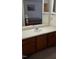 Bathroom includes a mirror, sink, vanity, cabinets, and a bedroom in view at 139 Kingsbury Dr, Chapel Hill, NC 27514