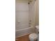Bathroom with a shower and tub combination with tile and vinyl flooring at 139 Kingsbury Dr, Chapel Hill, NC 27514