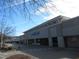 Exterior view of a commercial building with various stores and a parking lot in front at 139 Kingsbury Dr, Chapel Hill, NC 27514