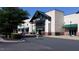 Harris Teeter store entrance showcases large windows and convenient access in a well-maintained shopping area at 139 Kingsbury Dr, Chapel Hill, NC 27514
