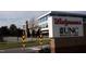 Exterior shot of the Walgreens and UNC Health Care building showcasing modern architecture and convenient location at 139 Kingsbury Dr, Chapel Hill, NC 27514