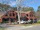Attractive brick office building, featuring peaked roof elements and ample parking for businesses and clients at 139 Kingsbury Dr, Chapel Hill, NC 27514