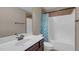 Bathroom featuring white countertops, vanity, and shower with blue curtain at 1426 Phelps Ridge Dr, Fuquay Varina, NC 27526