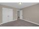Bedroom with neutral paint, carpet, white trim and a closet at 1426 Phelps Ridge Dr, Fuquay Varina, NC 27526
