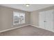 Bedroom featuring a window, neutral paint, and carpet flooring at 1426 Phelps Ridge Dr, Fuquay Varina, NC 27526