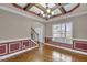 Bright dining room with hardwood floors, chandelier, opening to foyer and stairway at 1426 Phelps Ridge Dr, Fuquay Varina, NC 27526