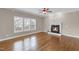 Large living area with fireplace and windows at 1426 Phelps Ridge Dr, Fuquay Varina, NC 27526