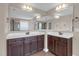 Spacious main bathroom featuring double vanity and glass-enclosed shower at 1426 Phelps Ridge Dr, Fuquay Varina, NC 27526