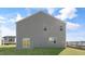 This home features a side sliding glass door with a sodded yard at 151 Paper Birch Way, Fuquay Varina, NC 27526