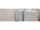 A dedicated laundry room features a washing machine and dryer at 151 Paper Birch Way, Fuquay Varina, NC 27526