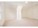 Spacious bedroom with white carpet and walls, providing a clean and bright atmosphere at 1514 Wiljohn Rd, Garner, NC 27529