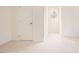 Clean, carpeted bedroom offers potential and features a door for convenient access at 1514 Wiljohn Rd, Garner, NC 27529