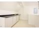 Bonus room with built in cabinets and large window at 1514 Wiljohn Rd, Garner, NC 27529