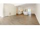 Open concept kitchen with stainless appliances and sleek, modern finishes at 1514 Wiljohn Rd, Garner, NC 27529
