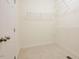 A simple walk-in closet with a door and wire shelving at 1514 Wiljohn Rd, Garner, NC 27529