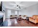 Spacious living room with hardwood floors, neutral paint, fireplace, and lots of natural light at 197 Royal Oak Ln, Garner, NC 27529