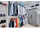 Spacious walk-in closet with shelving for shoes and clothes, plus a secure Winchester safe at 197 Royal Oak Ln, Garner, NC 27529