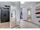 Spacious walk-in closet with shelving, storage and full-length mirror reflecting an adjacent room at 197 Royal Oak Ln, Garner, NC 27529