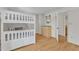 Clean bedroom with a bunk bed, dresser, and hardwood floors, providing a functional and stylish space at 206 Spring Ln, Chapel Hill, NC 27514