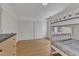 Bright bedroom with white bunk beds, wood floors, and natural light, offering a cozy and functional living space at 206 Spring Ln, Chapel Hill, NC 27514