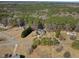 Expansive property viewed from above showing the spacious lot and mature trees at 208 Hunting Lodge Rd, Clayton, NC 27520