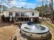 Expansive backyard features a multi-tiered deck, covered patio, and above-ground pool at 208 Hunting Lodge Rd, Clayton, NC 27520