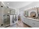 Bright and spacious bathroom with walk-in shower, double sink, and stylish fixtures at 208 Hunting Lodge Rd, Clayton, NC 27520