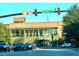 Street view of building with large windows, located at the corner of Academy Street at 228 Adams St, Cary, NC 27513