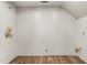 Unfinished basement with wood flooring and plumbing fixtures provides a great space for customization at 2318 Rogers Rd, Graham, NC 27253
