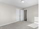 Neutral bedroom with white trim and carpet at 2318 Rogers Rd, Graham, NC 27253