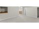 Large bonus room with a sink and shelving that has carpet flooring at 2318 Rogers Rd, Graham, NC 27253