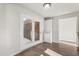 Bright sun room with hardwood floors, french doors and a built-in shelf at 2318 Rogers Rd, Graham, NC 27253