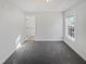 This bedroom features plush carpet, neutral walls, and ample natural light from a single, large window at 25 Scotch Bonnet Rdg, Clayton, NC 27520