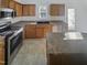 Functional kitchen featuring stainless steel appliances and generous counter space at 25 Scotch Bonnet Rdg, Clayton, NC 27520