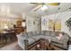 Comfortable living room featuring a large sectional sofa and adjacent kitchen and dining area at 2513 Drexall Ave, Durham, NC 27704