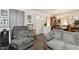 Comfortable living space with a cozy seating area and access to the dining area at 2513 Drexall Ave, Durham, NC 27704