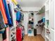 Walk-in closet with ample shelving and hanging space, providing excellent organization for clothing and accessories at 254 Pedernales Dr, Smithfield, NC 27577